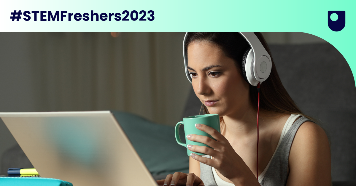 Feature image A woman wearing headphones is focused on using a laptop at a desk.