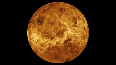 A view of the planet Venus from space, showcasing its thick atmosphere and bright, reflective surface